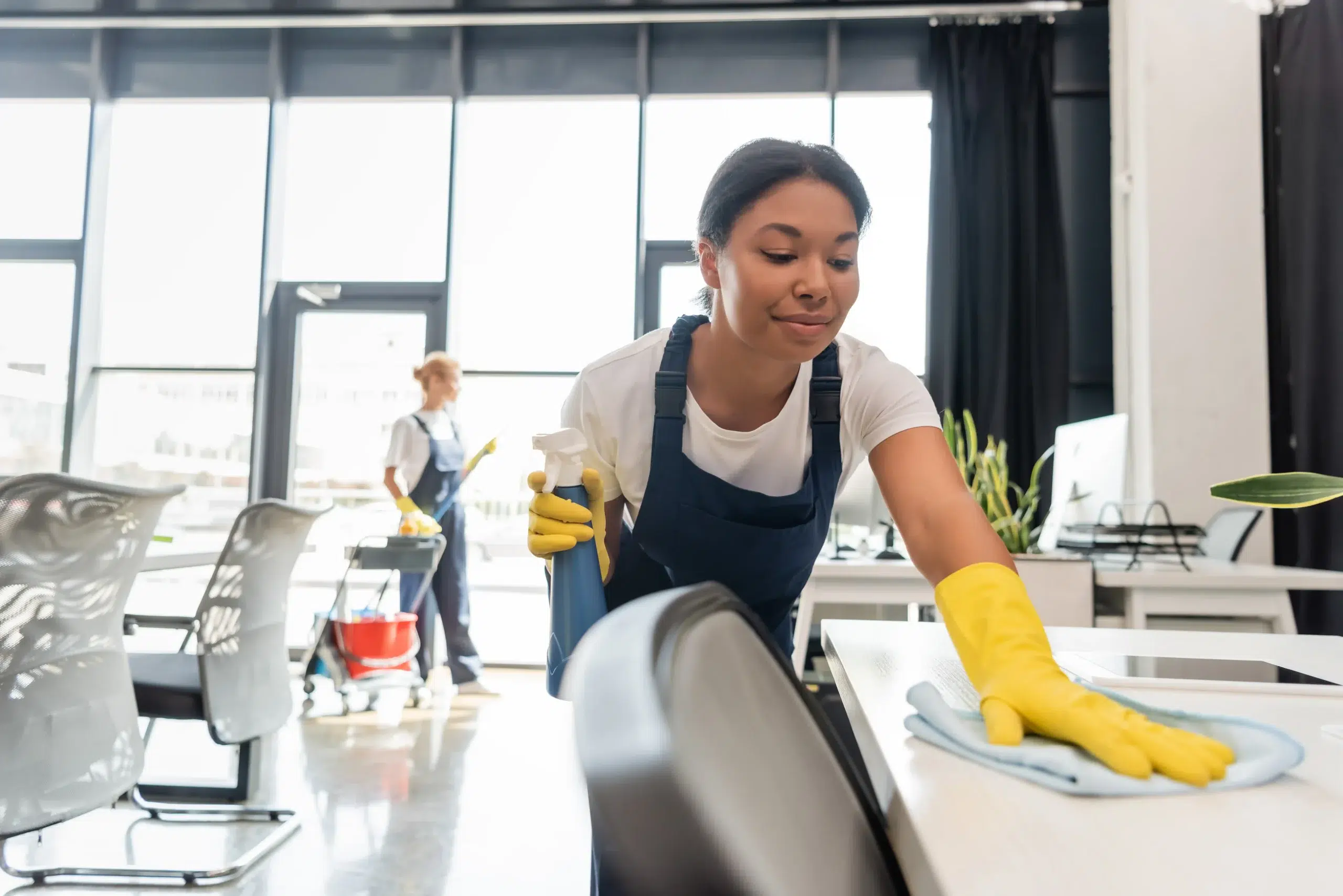The Ovaro Commercial team cleaning a bright, modern Austin office